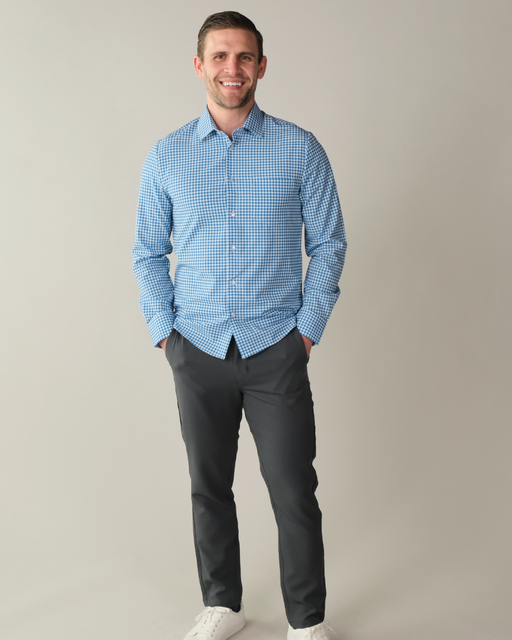 Man wearing royal blue and white gingham shirt