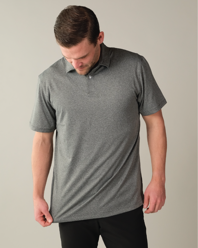 Man wearing a heather grey polo shirt