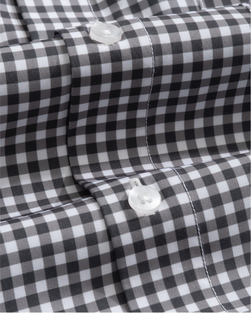Close-up of a a white and black gingham shirt