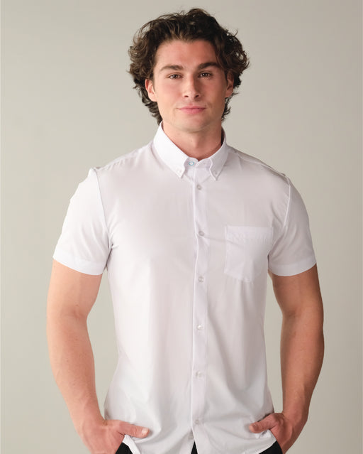 Man wearing a short sleeve white dress shirt with button down collar