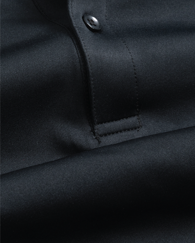 Close up pitch black polo shirt
