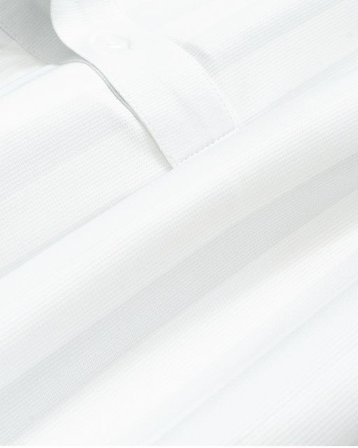 Fabric detail shot of white and gray striped short-sleeve polo shirt, showing texture