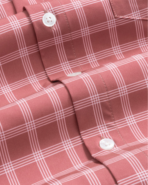 close up of adobe red with white windowpane shirt