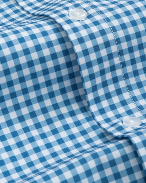 Close up royal blue and white gingham shirt