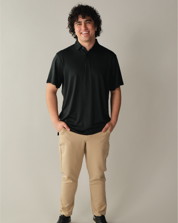 Man wearing pitch black polo shirt