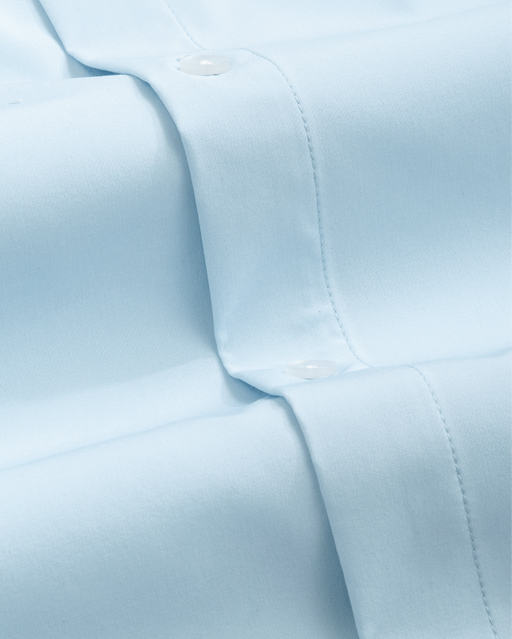 A pale blue dress shirt fabric close up