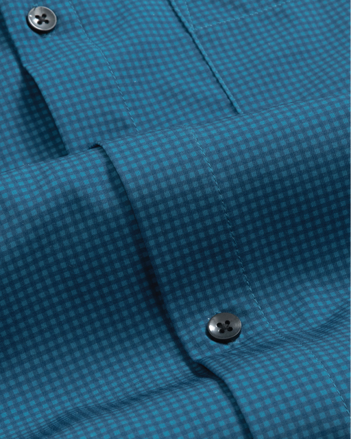 Close up dark blue with navy check shirt. Black buttons