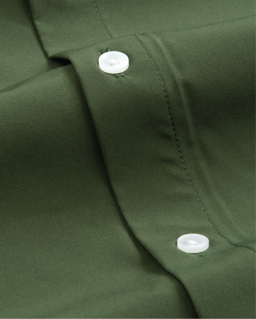 Close up of forest green shirt fabric