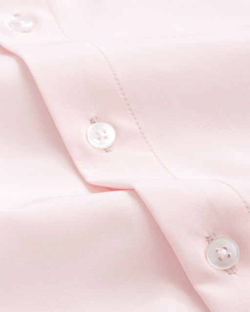 Close up of solid pink dress shirt