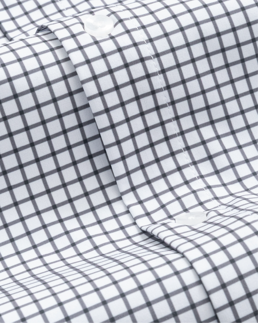 Close up of white with black check shirt