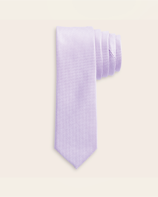 A solid light purple neck tie on a white background.