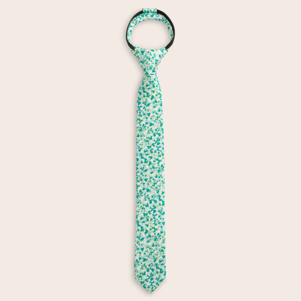 Green patterned zipper tie on a beige background